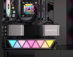 Close-up of Corsair GPU anti sag bracket propping a black RTX 4090 in a glass PC case, showing straight alignment and RGB lights below
