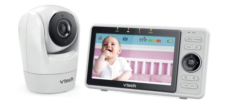 VTech VM901 baby monitor camera unit placed in a cozy nursery overlooking a crib with clear 1080p view